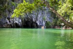 Boat coming out of the cave on the Underground River